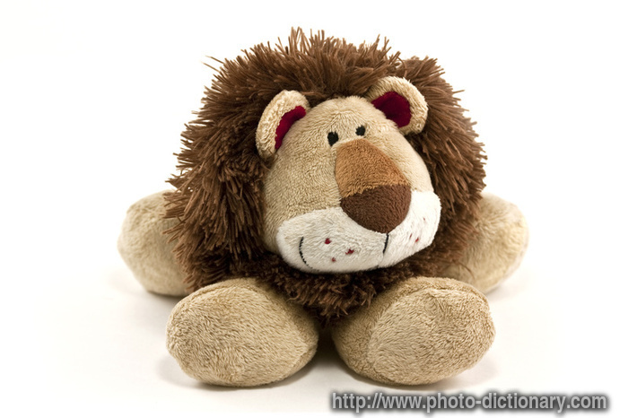 cuddly lion - photo/picture definition - cuddly lion word and phrase image