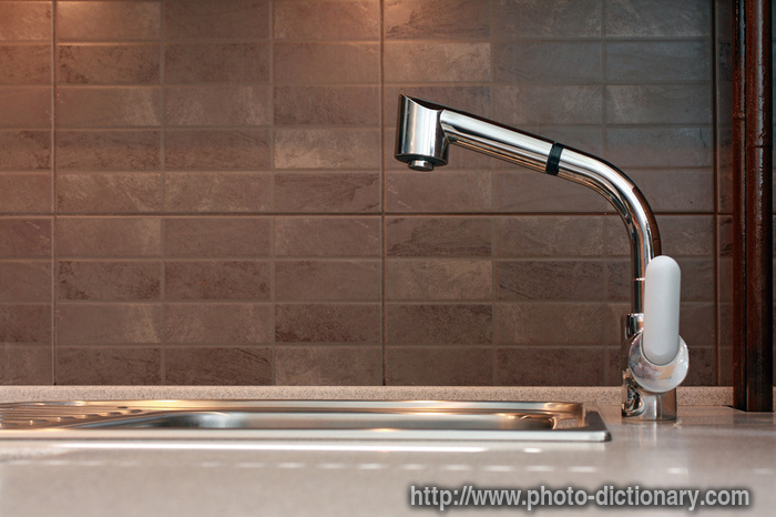 kitchen tap - photo/picture definition - kitchen tap word and phrase image