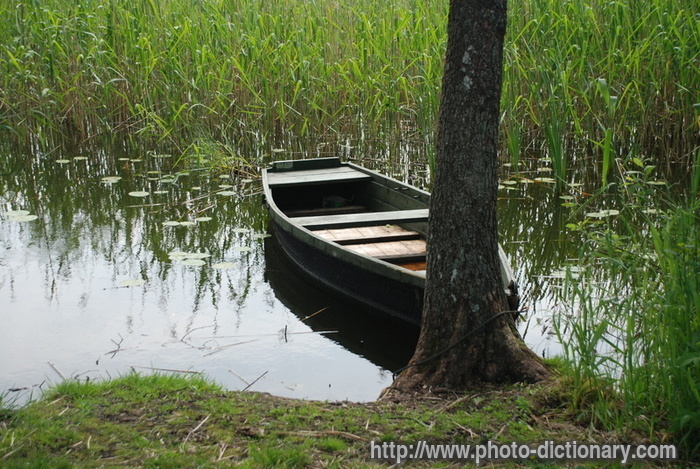 wooden boat - photo/picture definition - wooden boat word and phrase image