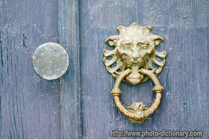 door knocker - photo/picture definition - door knocker word and phrase image