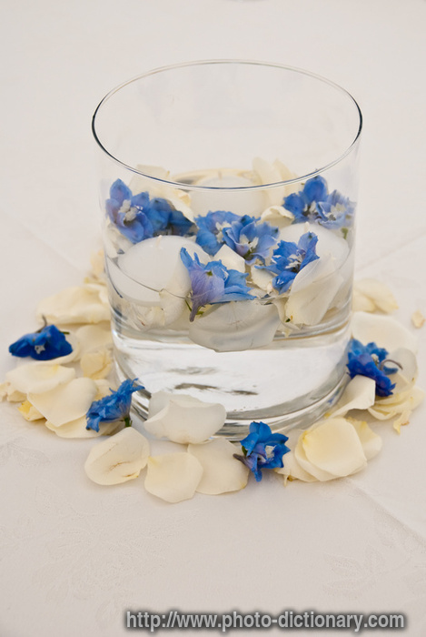glass bowl flowers - photo/picture definition - glass bowl flowers word and phrase image