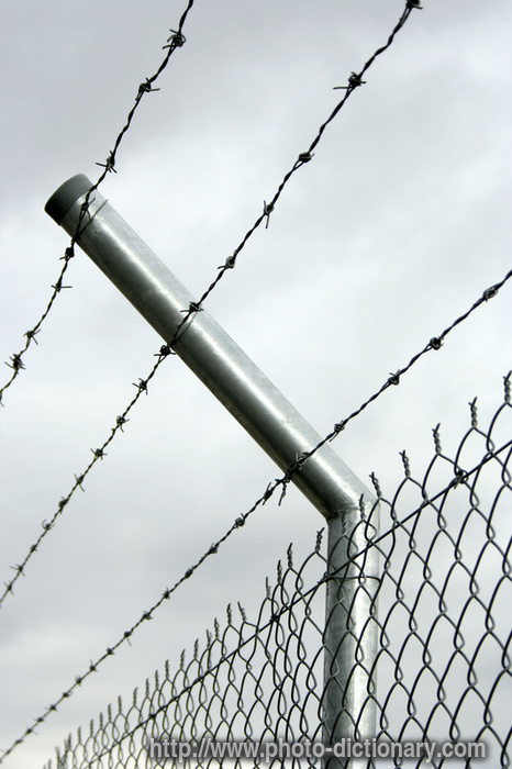security fence - photo/picture definition - security fence word and phrase image