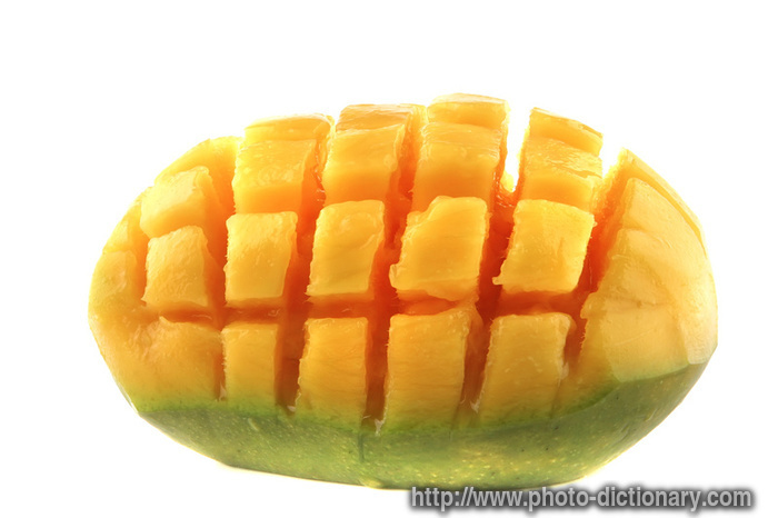 carved mango - photo/picture definition - carved mango word and phrase image