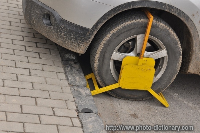 clamped wheel - photo/picture definition - clamped wheel word and phrase image