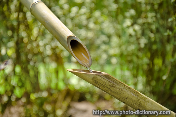 bamboo fountain - photo/picture definition - bamboo fountain word and phrase image