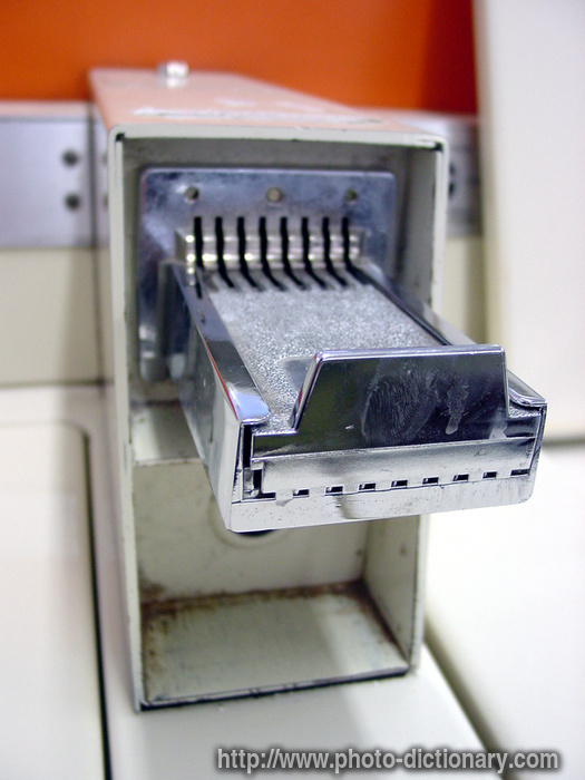 coin accepter - photo/picture definition - coin accepter word and phrase image