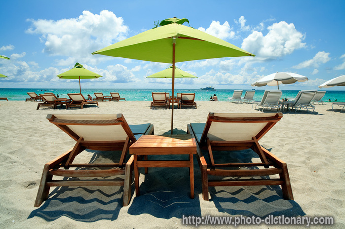 beach lounge chairs - photo/picture definition - beach lounge chairs word and phrase image