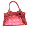 red handbag - photo/picture definition - red handbag word and phrase image