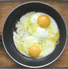 fried eggs - photo/picture definition - fried eggs word and phrase image