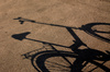bicycle shadow - photo/picture definition - bicycle shadow word and phrase image