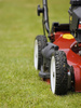 mowing grass - photo/picture definition - mowing grass word and phrase image
