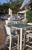 poolside tables - photo/picture definition - poolside tables word and phrase image