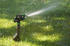 lawn sprinkler - photo/picture definition - lawn sprinkler word and phrase image