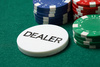 dealer button - photo/picture definition - dealer button word and phrase image