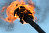 flaming torch - photo/picture definition - flaming torch word and phrase image