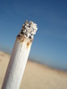 burning cigarette - photo/picture definition - burning cigarette word and phrase image