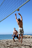 beach volleyball - photo/picture definition - beach volleyball word and phrase image