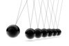 Newton's Cradle - photo/picture definition - Newton's Cradle word and phrase image