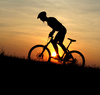 mountain biking - photo/picture definition - mountain biking word and phrase image
