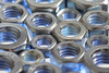 metal nuts - photo/picture definition - metal nuts word and phrase image