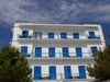 Greek apartment building - photo/picture definition - Greek apartment building word and phrase image