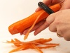 peeling a carrot - photo/picture definition - peeling a carrot word and phrase image