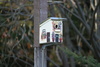 bird house - photo/picture definition - bird house word and phrase image