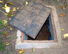 manhole cover - photo/picture definition - manhole cover word and phrase image