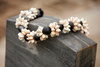 kukui nut shell lei - photo/picture definition - kukui nut shell lei word and phrase image