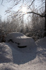 snow covered car - photo/picture definition - snow covered car word and phrase image