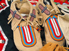 beaded moccasins - photo/picture definition - beaded moccasins word and phrase image